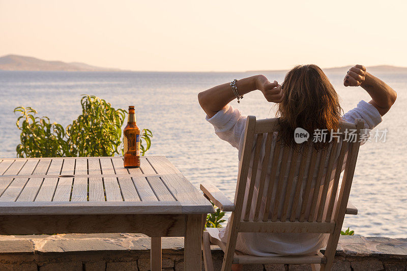 Cute woman drinking beer.